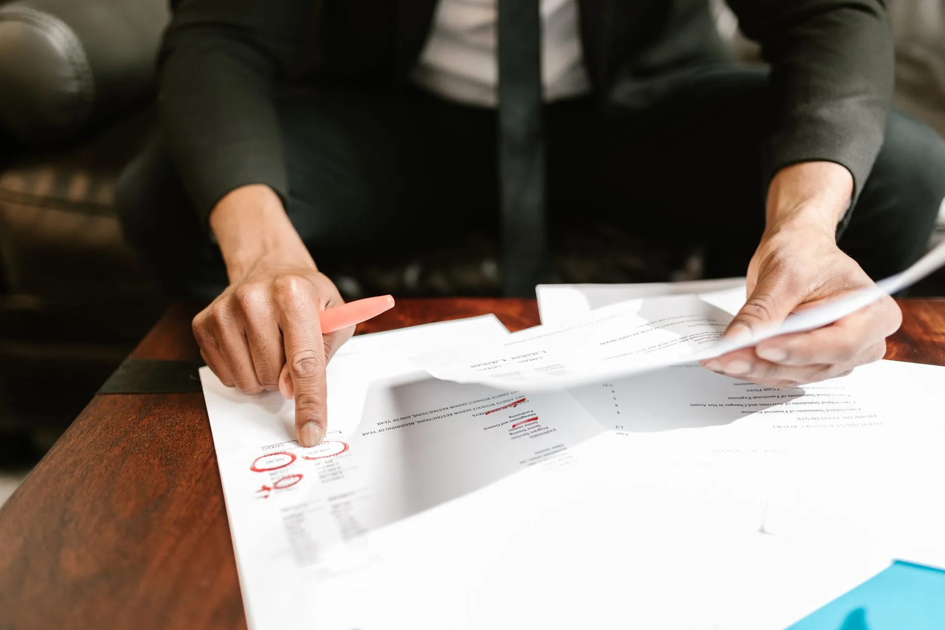 small business owner reviewing financial documents in shared office